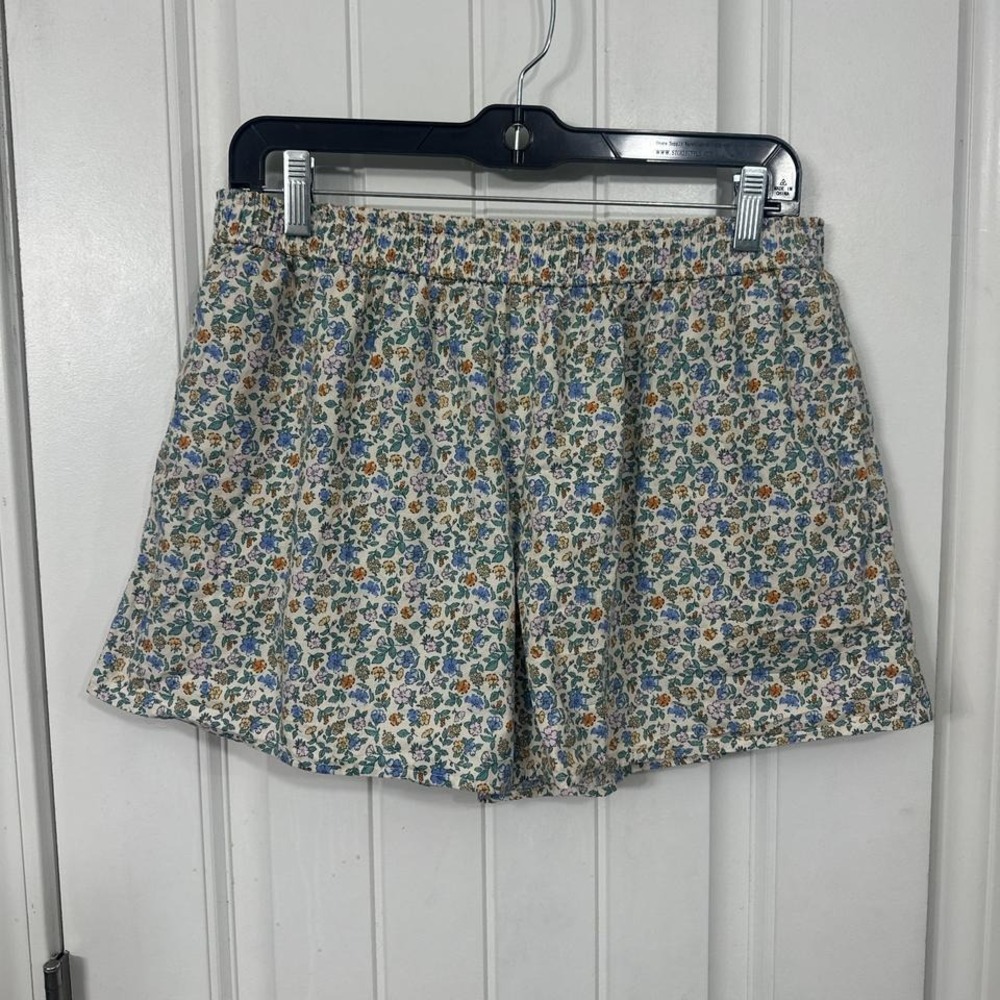Things between cute floral boxer like shorts. L